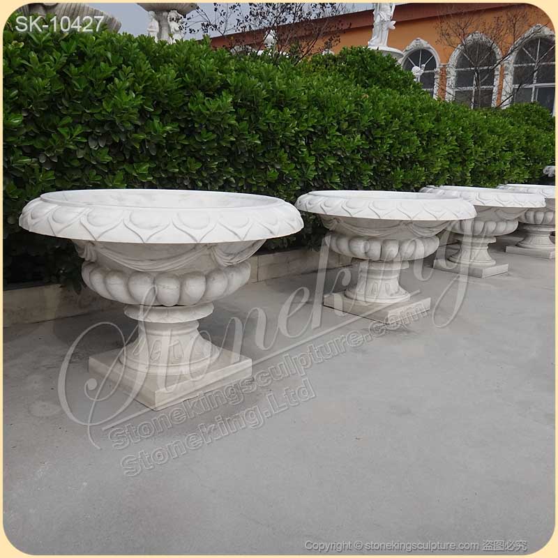 What Are the Advantages of Using Stone Planters in Landscaping?