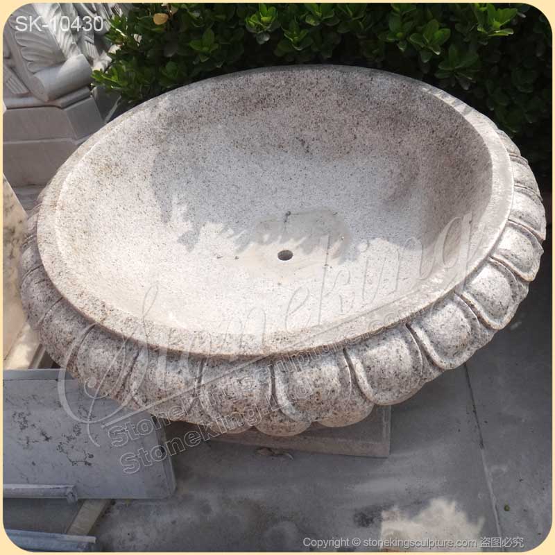 What Are the Advantages of Using Stone Planters in Landscaping?