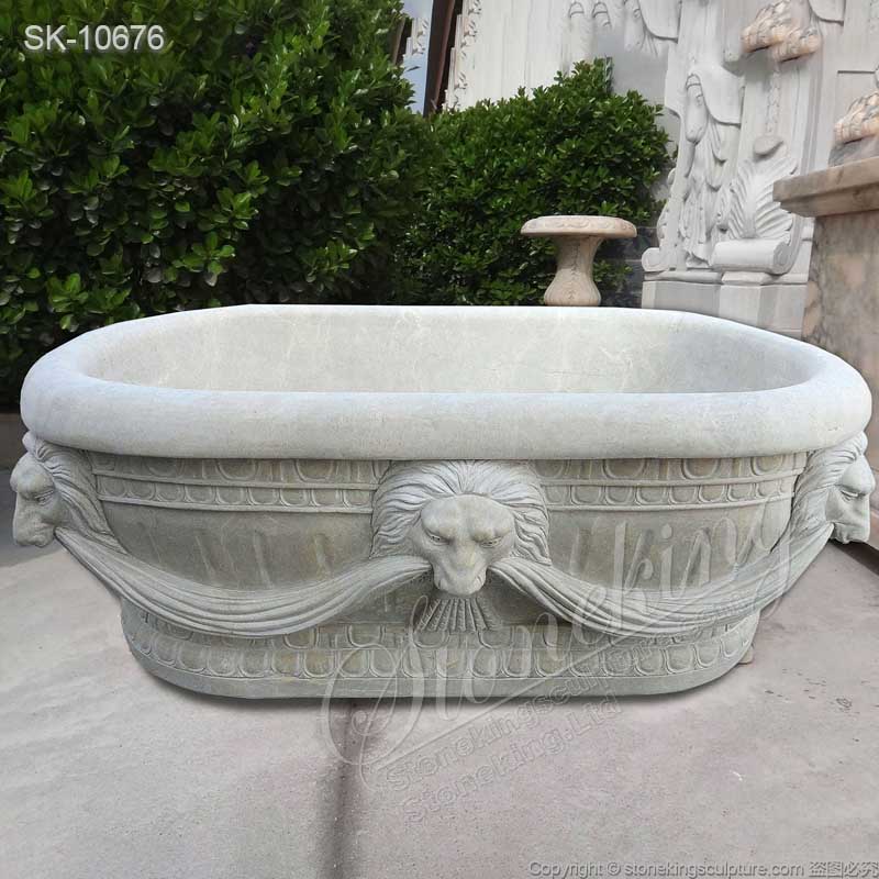 Wholesale Hand Carved Freestanding Oval Natural Stone Bathtub with Lion Head for sale 